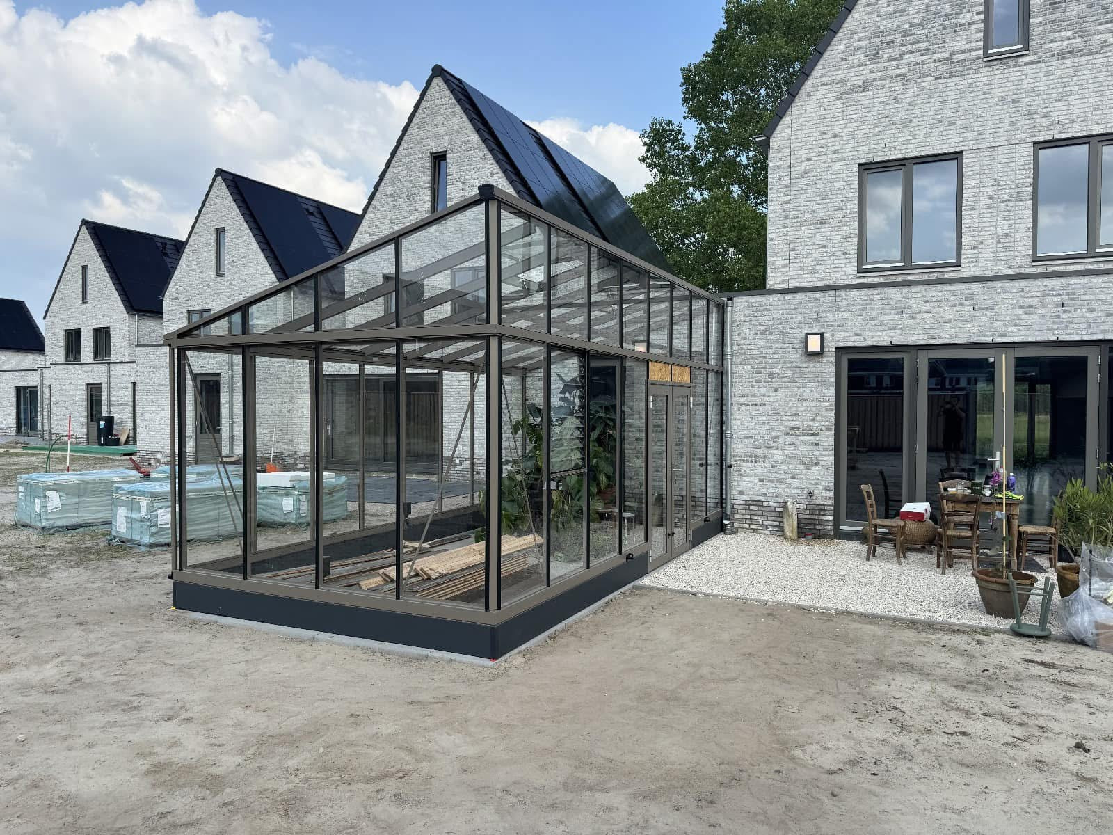 Modern Lean-to Style Glass Greenhouse